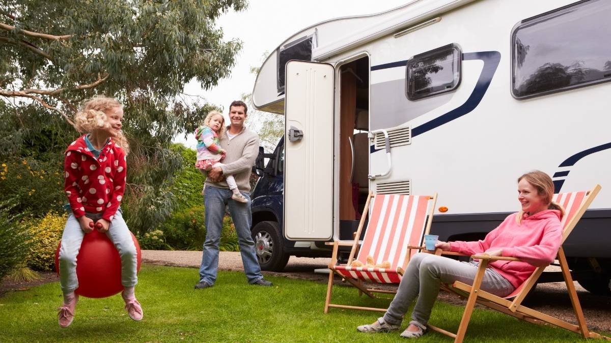 Private Campervan Hire - family enjoying camping holiday in motorhome